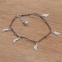 Sterling silver charm bracelet,