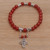 Carnelian beaded stretch charm bracelet, 'Sunset Cross' - Carnelian Beaded Stretch Bracelet with Sterling Silver Cross thumbail