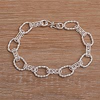 Sterling silver filigree link bracelet,