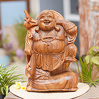 Wood sculpture, 'Traveling Buddha' - Hand-Carved Suar Wood Sculpture of Buddha from Bali