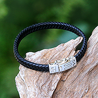 Leather braided wristband bracelet, 'Remember Good Times' - Unisex Braided Leather Wristband Bracelet from Bali