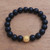 Gold accented onyx beaded stretch bracelet, 'Om Light' - Gold Plated Om Onx Beaded Stretch Bracelet from Bali thumbail