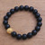 Gold accented onyx beaded stretch bracelet, 'Om Light' - Gold Plated Om Onx Beaded Stretch Bracelet from Bali (image 2b) thumbail
