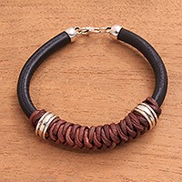 Leather and sterling silver braided pendant bracelet,