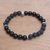 Onyx beaded stretch bracelet, 'Dark Skull' - Dark Onyx Skull Beaded Stretch Bracelet from Bali thumbail