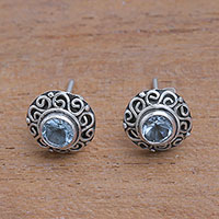 Blue topaz stud earrings, 'God Eye' - Swirl Pattern Blue Topaz Stud Earrings from Bali