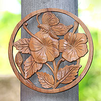 Wood relief panel, 'Butterfly on a Flower' - Floral Butterfly Suar Wood Relief Panel Crafted in Bali