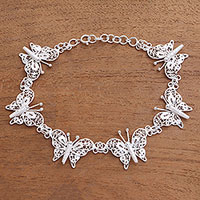 Sterling silver filigree link bracelet, 'Glittering Butterflies' - Sterling Silver Filigree Butterfly Link Bracelet from Java