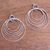 Sterling silver dangle earrings, 'Glistening Rings' - Circular Sterling Silver Dangle Earrings from Bali thumbail
