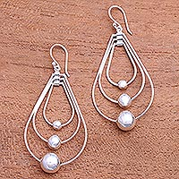 Sterling silver dangle earrings, 'Droplet Orbits' - Drop-Shaped Sterling Silver Dangle Earrings from Bali