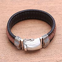 Men's braided leather wristband bracelet, 'Blessing of Strength in Brown' - Men's Brown Leather Braided Wristband Bracelet from Bali