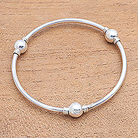Sterling silver bangle bracelet, 'Round Trio' - Orb Motif Sterling Silver Bangle Bracelet from Bali