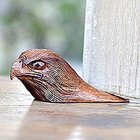 Wood doorstop, 'Eagle Head' - Suar Wood Eagle Door Stop
