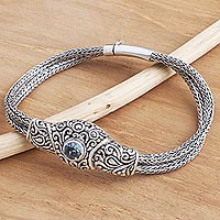 Blue topaz pendant bracelet, 'Forest Circle' - Balinese Sterling Silver Pendant Bracelet with Blue Topaz