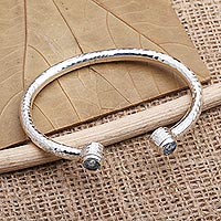 Blue topaz cuff bracelet, 'Sparkling Whitecaps' - Sterling Silver and Blue Topaz Cuff Bracelet