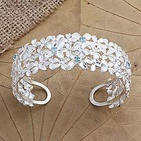 Blue topaz cuff bracelet, 'Clear Skies Ahead' - Blue Topaz and Sterling Silver Floral Cuff Bracelet