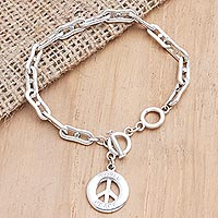 Sterling silver charm bracelet, 'Peace Everywhere' - Sterling Silver Peace Sign Charm Bracelet