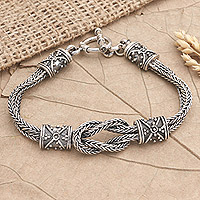 Men's sterling silver pendant bracelet, 'Strong Love' - Men's Sterling Silver Naga Chain Pendant Bracelet