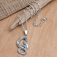 Men's sterling silver pendant necklace, 'Infinite Fantasy' - Men's Handcrafted Sterling Silver Pendant Necklace