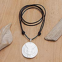 Men's bone pendant necklace, 'Ferocious Bull' - Men's Handcrafted Bone Pendant Necklace with Leather Cord