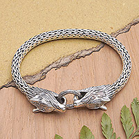Men's sterling silver chain pendant bracelet, 'Wolf Brotherhood' - Men's Sterling Silver Chain Bracelet with Wolf Pendants