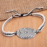 Cotton wristband pendant bracelet, 'Balinese Friendship' - Black and White Wristband Pendant Bracelet Crafted in Bali
