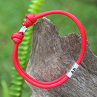 Sterling silver pendant cord bracelet, 'Lineage AB' - Sterling Silver and Cord Pendant Bracelet in Red