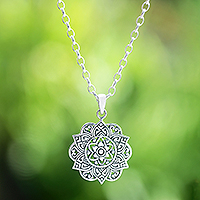 Sterling silver pendant necklace, 'Saraswati Lotus' - Lotus-Themed Sterling Silver Pendant Necklace from Bali