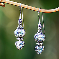 Blue topaz drop earrings, 'Woman's Love in Blue' - Balinese Sterling Silver Drop Earrings with Blue Topaz Stone
