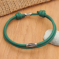 Sterling silver pendant cord bracelet, 'Lagoon Sparkle' - Adjustable Green Nylon Cord Bracelet with Polished Pendant