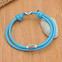 Sterling silver pendant cord bracelet, 'Heaven Sparkle' - Adjustable Sky Blue Nylon Cord Bracelet with Polished Accent