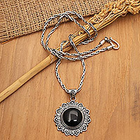 Onyx pendant necklace, 'Midnight Sunflower' - Onyx & Sterling Silver Sunflower Pendant Necklace from Bali