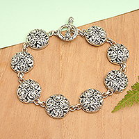 Sterling silver link bracelet, 'Floral Swirls' - Floral Polished Sterling Silver Link Bracelet from Bali