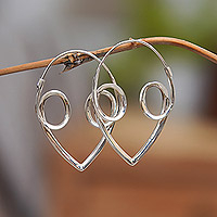 Sterling silver hoop earrings, 'Romantic Sensations' - Polished Abstract Sterling Silver Hoop Earrings from Bali