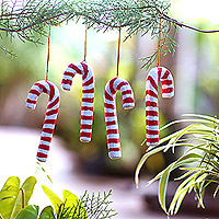 Wood ornaments, 'Santa Cane' (set of 4) - Set of 4 Red and White Candy Cane Albesia Wood Ornaments