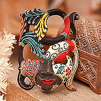 Batik wood mask, 'Infinite Woman' - Handcrafted Nature-Themed Batik Pule Wood Mask from Java