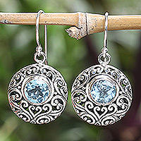 Blue topaz dangle earrings, 'Shimmering Blooms' - Sterling Silver Blue Topaz Dangle Earrings with Vine Motifs