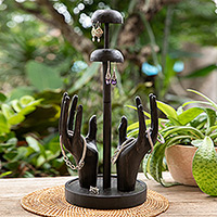 Wood jewelry stand, 'Nocturnal Majesty' - Hand-Carved Black Jempinis Wood Jewelry Stand