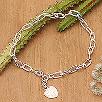 Sterling silver charm bracelet, 'Jolly Heart' - High-Polished Sterling Silver Heart-Shaped Charm Bracelet