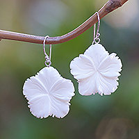Hand-carved dangle earrings, 'Snowy Hibiscus' - Hand-Carved Hibiscus Bloom-Shaped Dangle Earrings