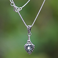 Blue topaz pendant necklace, 'Arrow of Loyalty' - Two-Carat Blue Topaz Arrow-Shaped Pendant Necklace