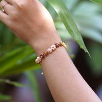 Gold-accented crystal beaded bracelet, 'Bohemian Petals' - Floral Gold-Accented Crystal Beaded Bracelet in Warm Hues