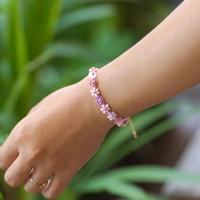 Gold-accented crystal beaded bracelet, 'Graceful Petals' - Floral Adjustable Pink and Purple Crystal Beaded Bracelet