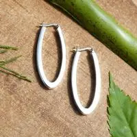 Sterling silver hoop earrings, 'Tomorrow Lasso' - High-Polished Minimalist Oval Sterling Silver Hoop Earrings