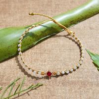 Gold-accented aquamarine and recycled glass beaded macrame pendant bracelet, 'Be Classy' - Gold-Accented Aquamarine and Recycled Glass Macrame Bracelet