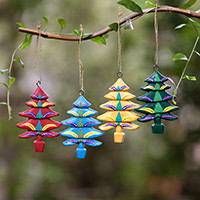 Wood ornaments, 'Colorful Pines' (set of 4) - 4 Christmas Pine Tree-Themed Hand-Painted Wood Ornaments