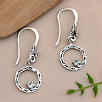 Blue topaz dangle earrings, 'Botanical Radiance' - Blue Topaz Silver Dangle Earrings with Floral and Leaf Theme