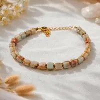 Gold-accented jasper beaded link bracelet, 'Magical Galaxy' - Gold-Accented Bracelet with Knotted Cube-Shaped Jasper Gems