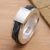 Leather and silver band ring, 'Buckskin' - Sterling Silver and Leather Band Ring from Indonesia thumbail