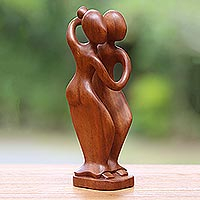 Wood sculpture Step Forward Indonesia